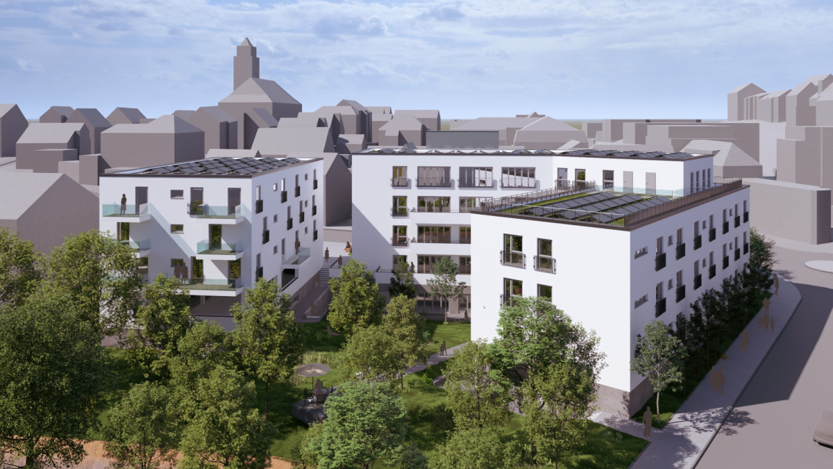 Wei&szlig;es Geb&auml;ude mit Flachdach und B&auml;umen, U-f&ouml;rmig angeordnet